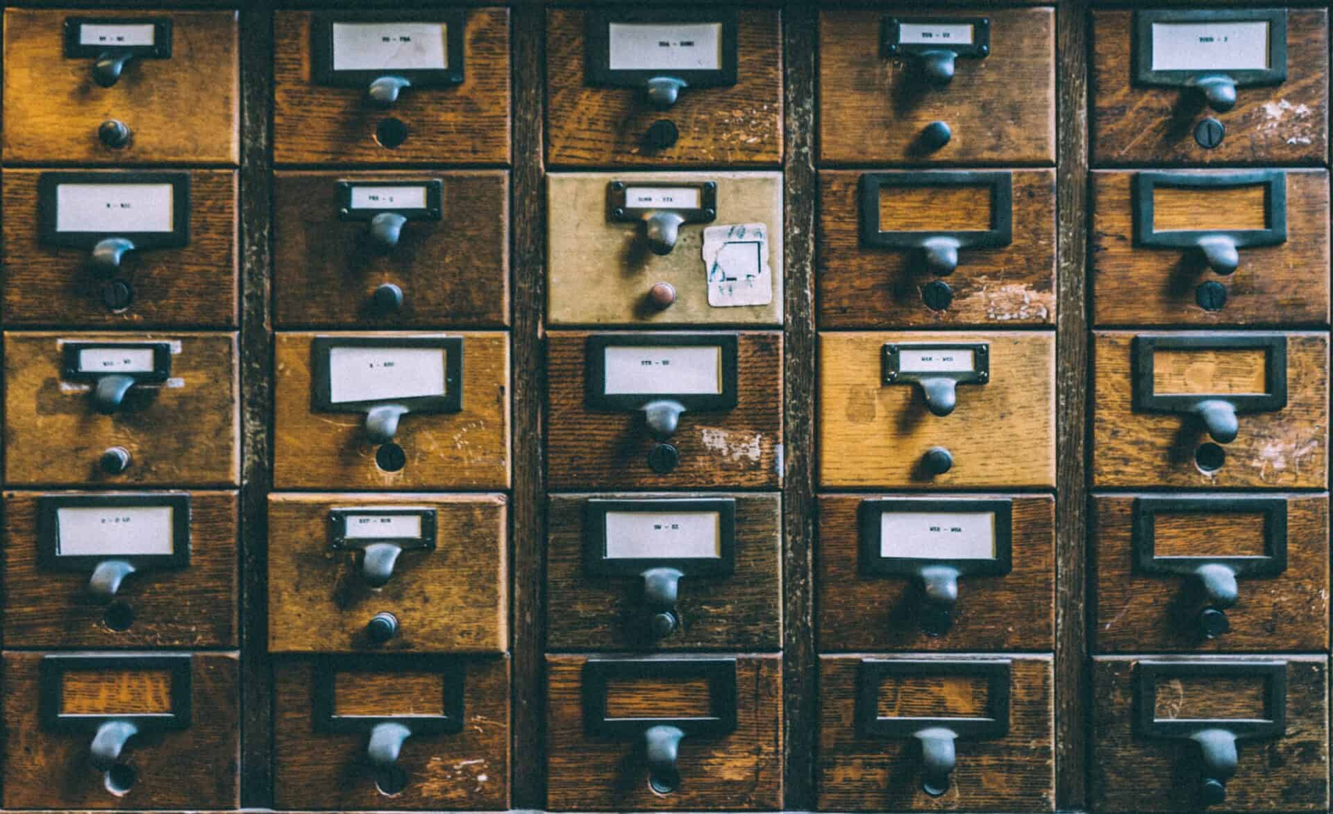 Vintage wooden storage drawers for logistics and shipping purposes.